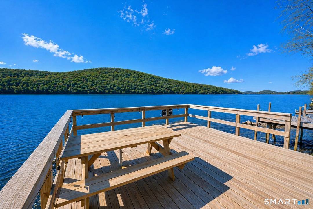 Direct waterfront on Candlewood Lake, conveniently located in the Hemlock Shores community in Danbury.