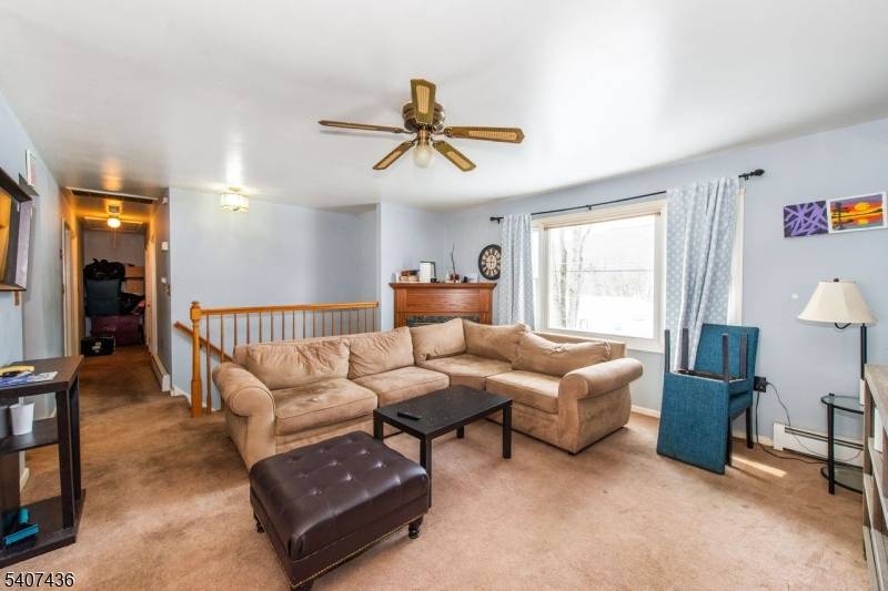 Nestled in a highly desirable neighborhood, this charming raised ranch offers the perfect blend of comfort and convenience.