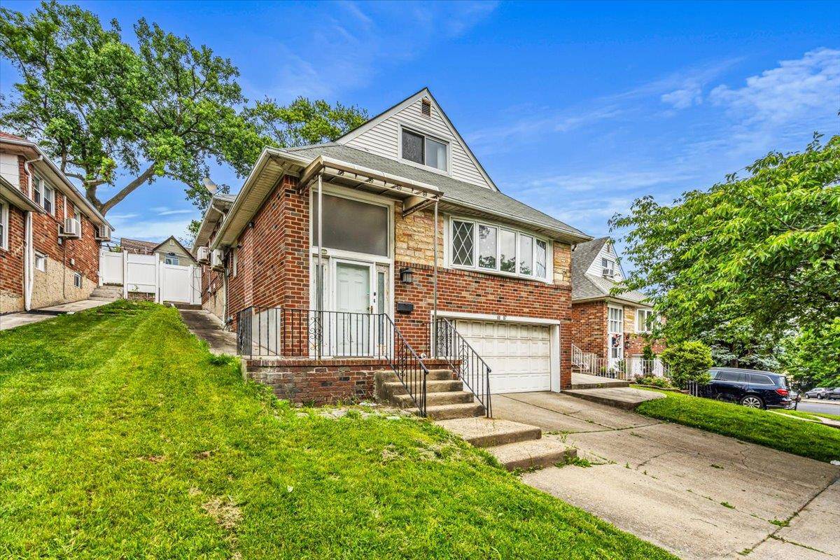 Welcome to this move in ready split level brick home in Glen Oaks offering bright, spacious interiors across five levels perfect for flexible living and entertaining.