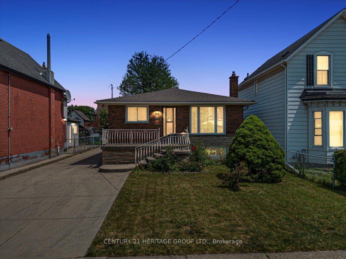 Welcome to 124 Tisdale Avenue North, a classic all brick bungalow that's been lovingly cared for by the same family for decades !