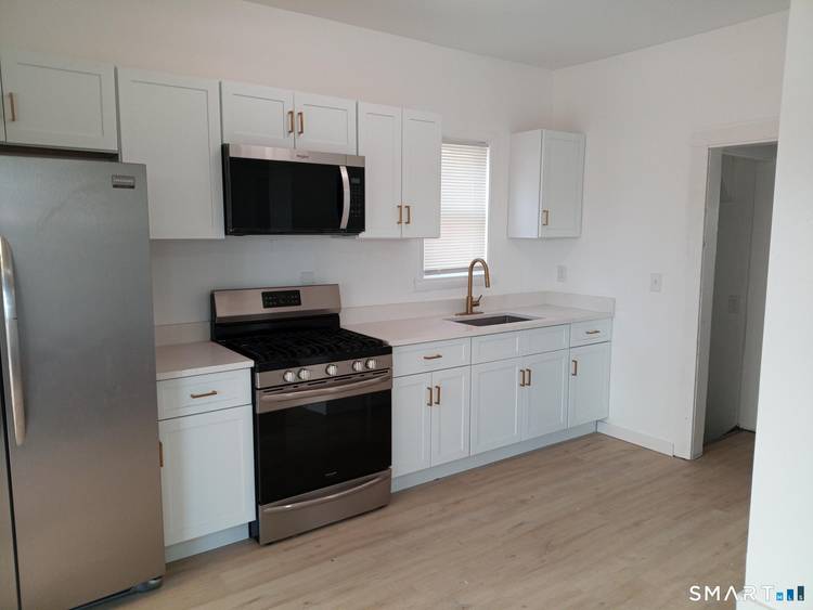Spacious Newly Remodeled 4 Bedroom Half Duplex Near the New Haven East Haven Town Line Welcome to this newly remodeled 4 bedroom, 2 full bath half duplex offering comfortable living ...
