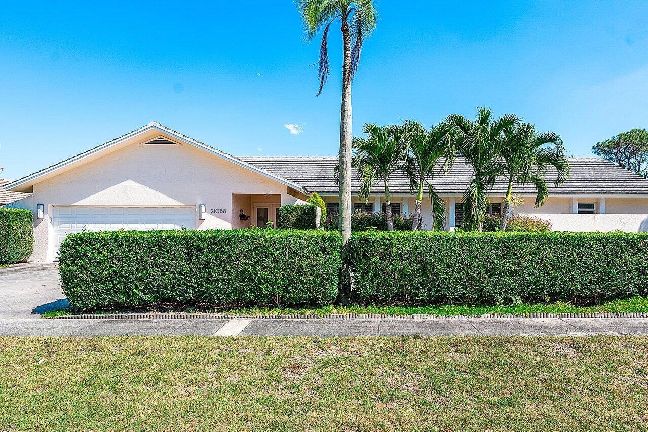 Nestled in centrally located Boca Raton, this 4 bedroom, 3.