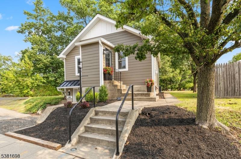 Step inside this beautifully renovated bungalow and discover a perfect blend of charm and modern comfort.