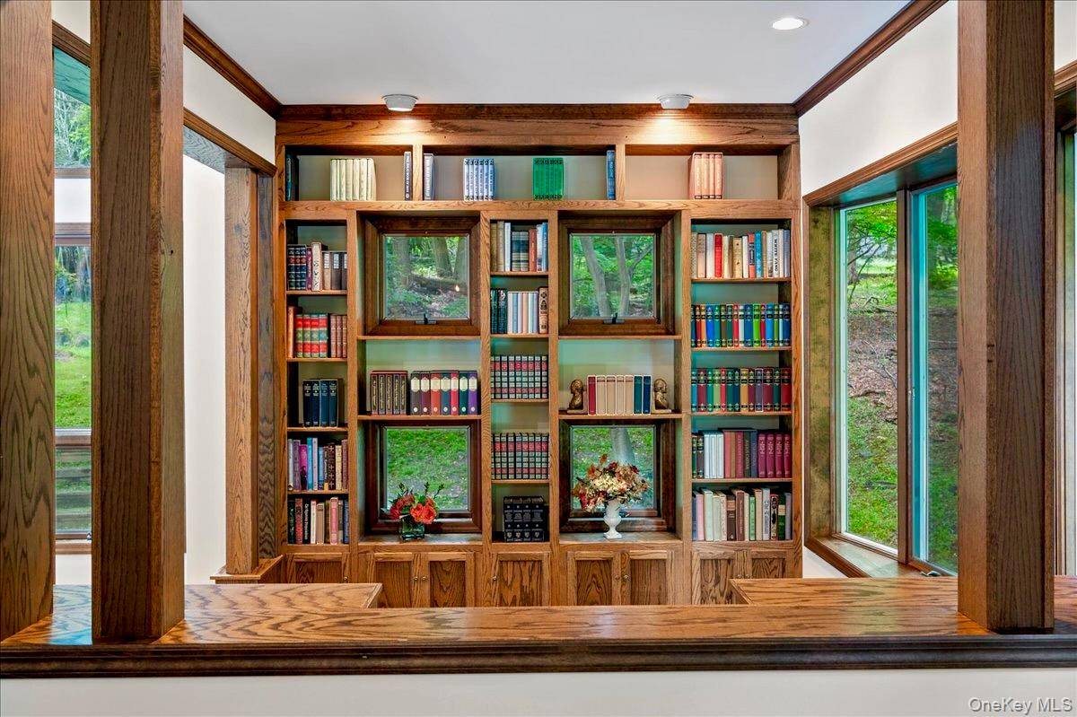 Set on nearly an acre of mature landscaped grounds, this Upper Nyack home offers privacy, style and effortless indoor outdoor living.