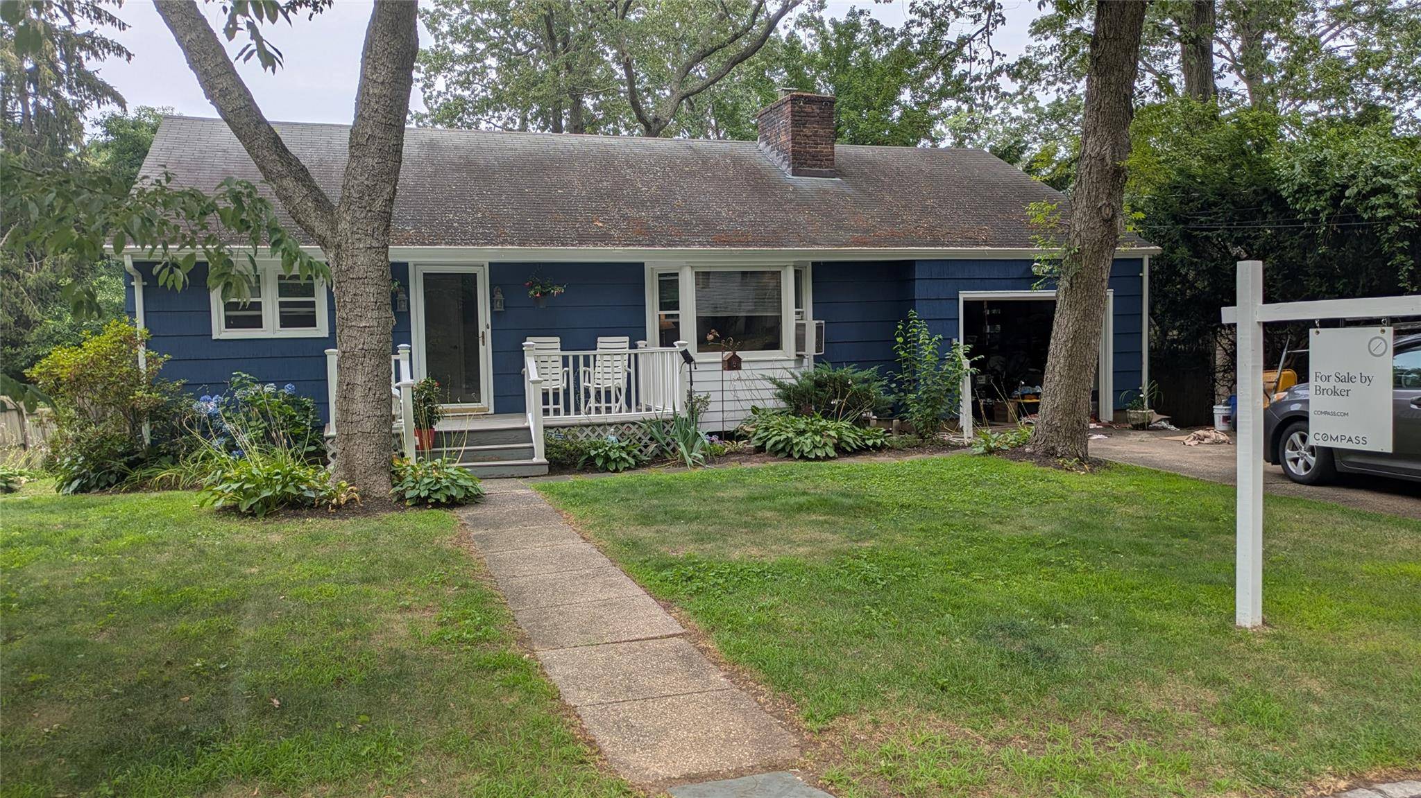 Nestled amid lush greenery, this delightful ranch style home offers peaceful living in the heart of Bayville.