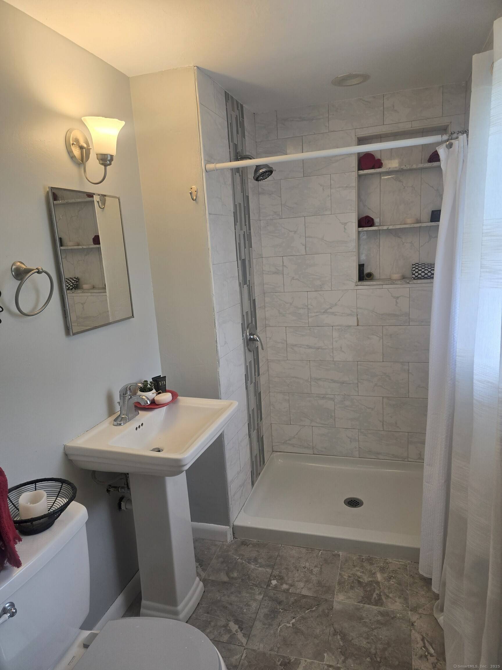 HOME SWEET HOME ! This oversized ranch is a rare find featuring 5 bedrooms, 2 1 2 baths, a 2 car garage, a pellet stove, and dual basements all on ...
