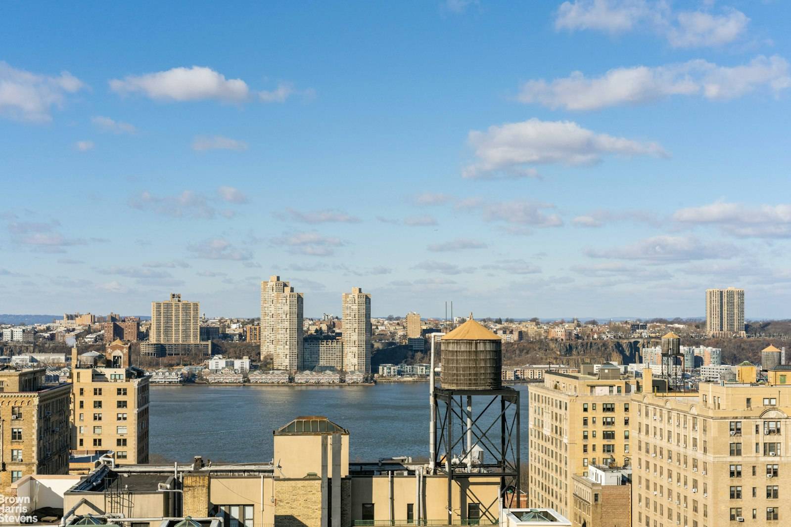 PRICE JUST REDUCED ! Lovely, light and bright, split 2 bedroom 2 bath apartment with open Hudson River and westerly views !