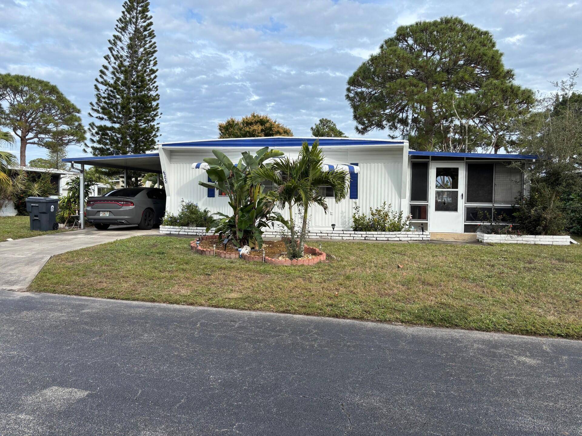 SPACIOUS 2 BEDROOMS, 2 BATHS AND ENCLOSED FLORIDA ROOM WITH SEPARATE ENTRANCE.