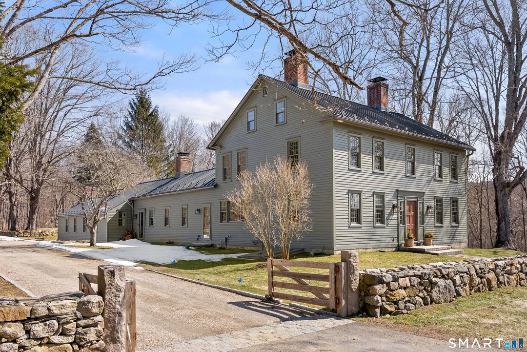 The Jesse Peck Lambert Homestead, built in 1805 thoughtfully restored, provides a seamless blend of historic charm modern comfort.