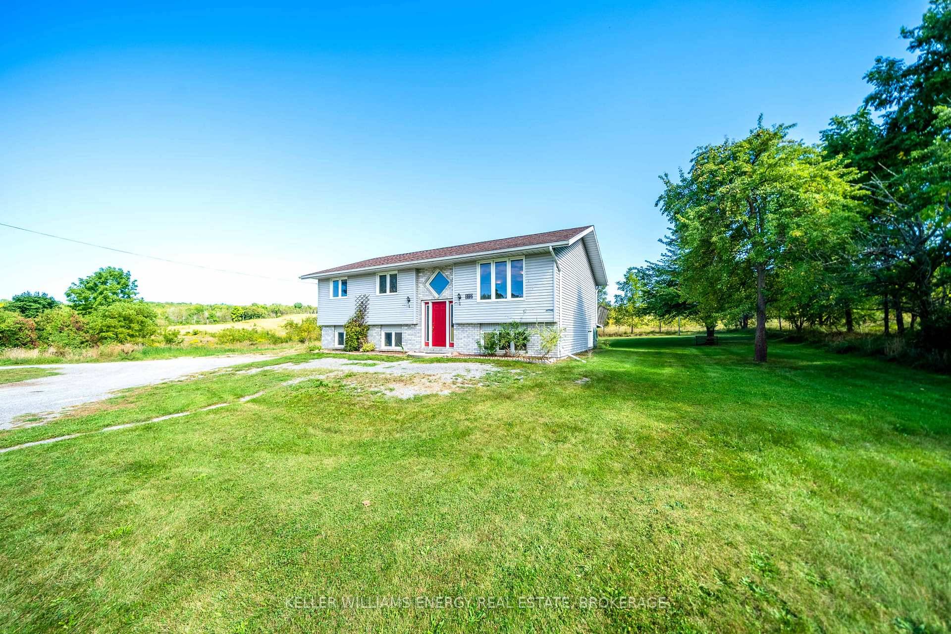 Discover the ideal blend of commercial opportunity and residential comfort at 12699 Loyalist Parkway, located just on the edge of Picton's vibrant downtown.