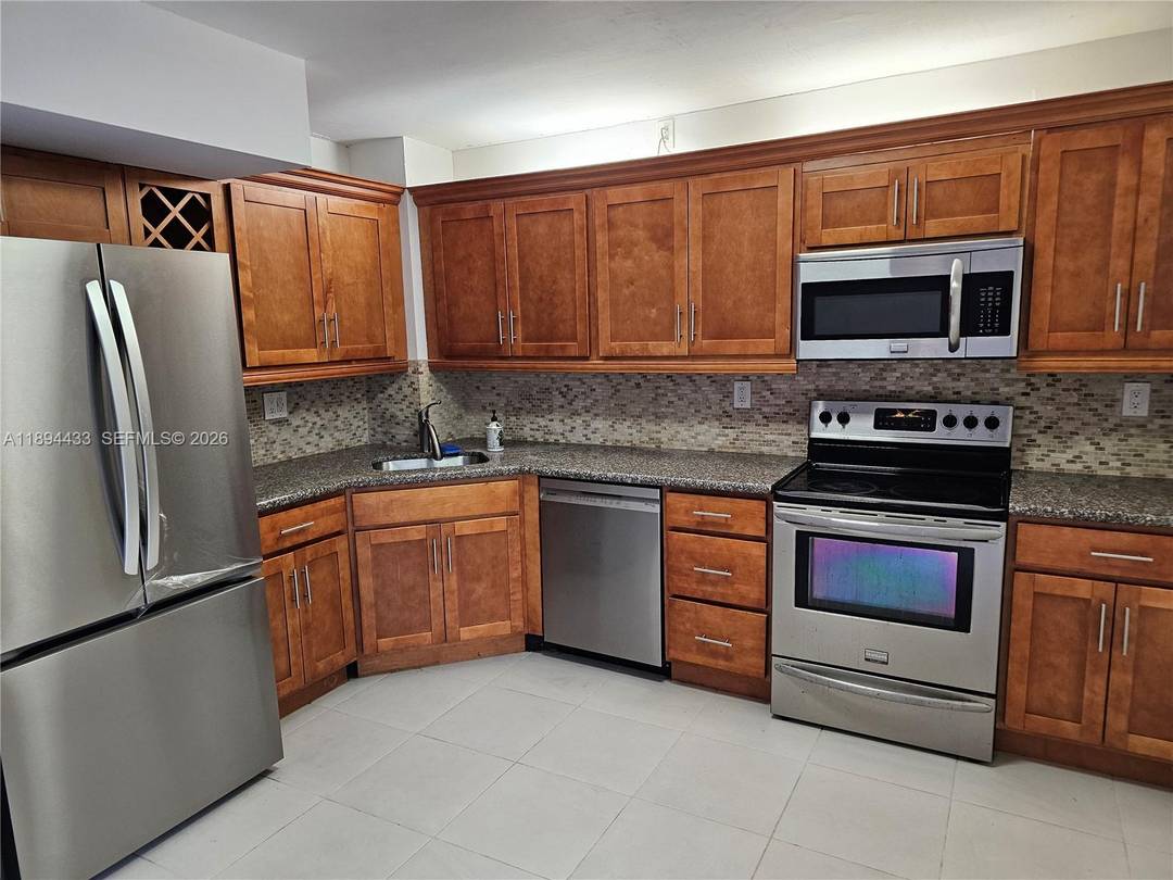 Substantially remodeled 3 Bedroom 2 1 2 bath unit.