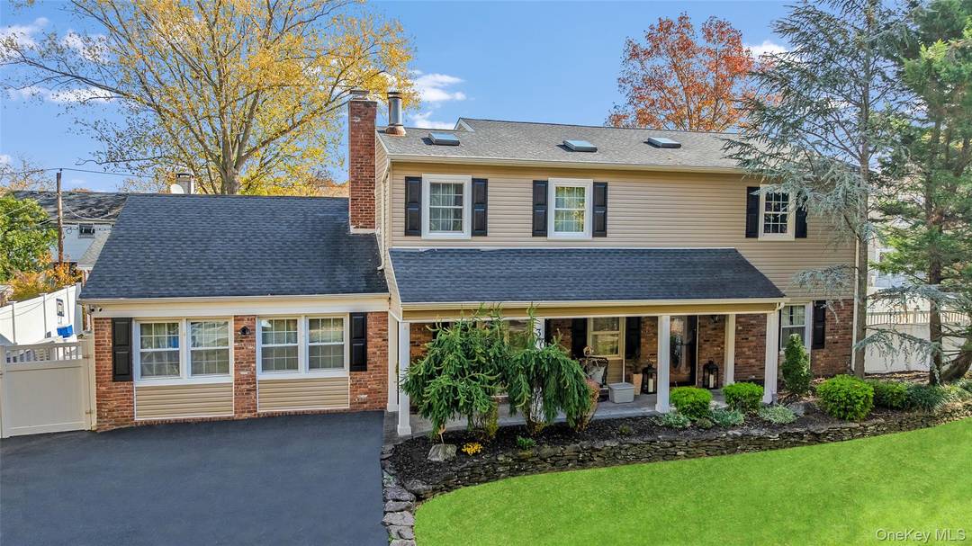 Welcome to this beautifully maintained Colonial located in the desirable Village of Lake Grove.