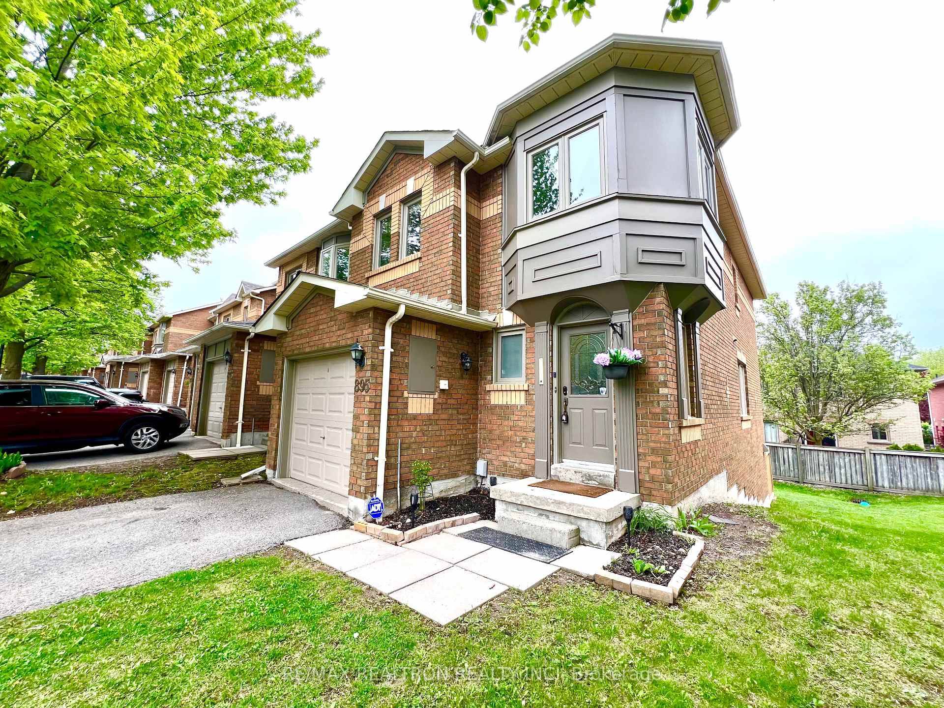 Bright and spacious end unit townhouse in a prime location with a walk out basement !