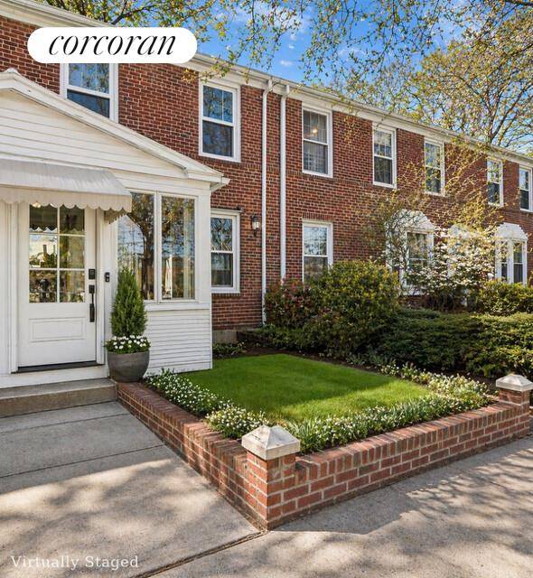 Beautifully renovated single family home in the heart of Sunnyside Gardens overlooking historic Jefferson Court.