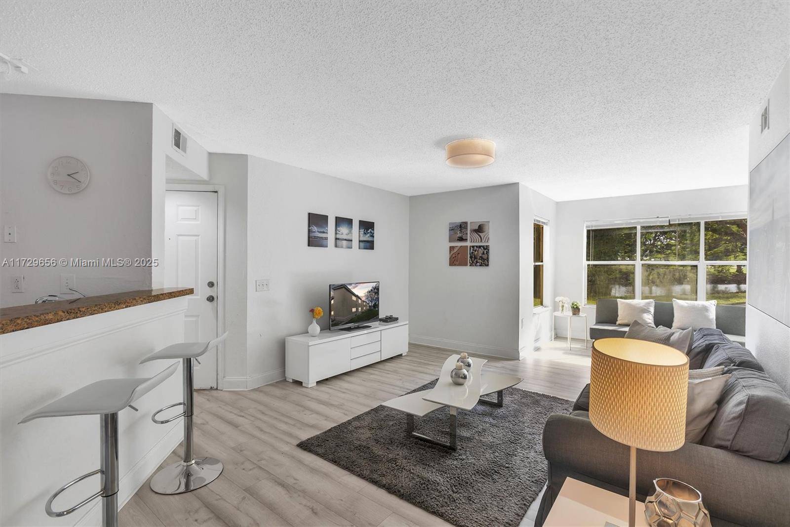 Welcome to this beautifully furnished 2 bedroom, 2 bathroom condo located in the Isles at Lago Mar community in Sunrise, FL.