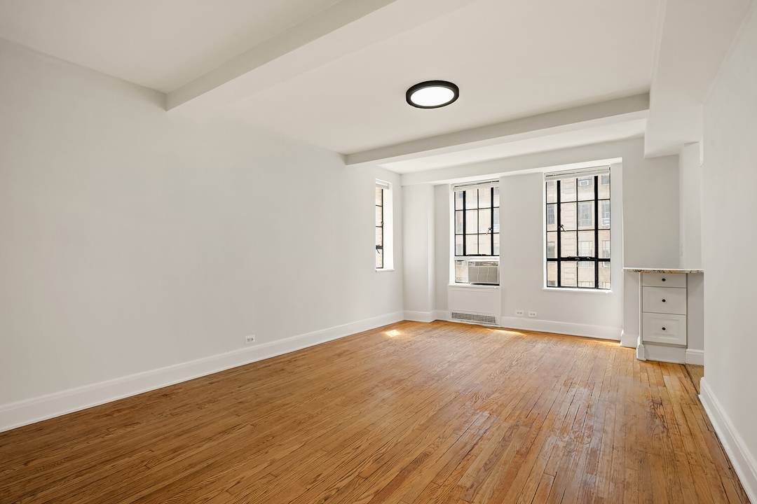 Enjoy magical open garden views of the building's beautifully maintained English gardens from this sun filled, south and east facing studio at The Parc Vendome one of Midtown West's most ...