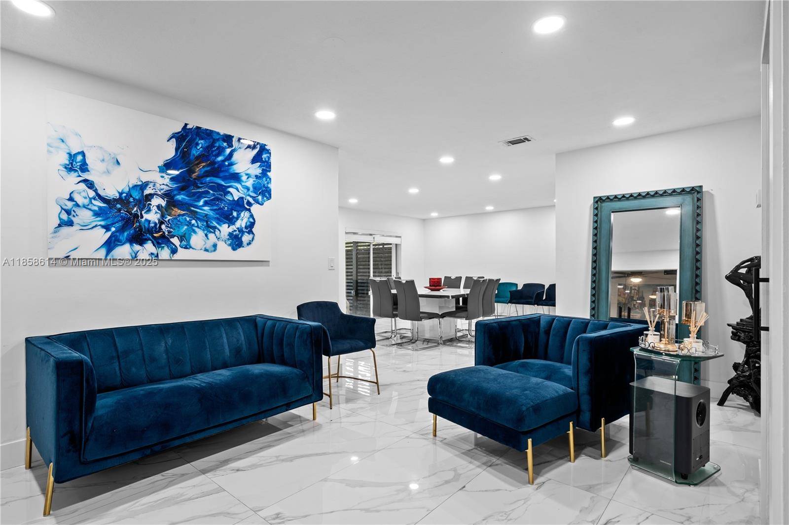 Spacious 4 Bedroom Den, 3 Bath Home in Marbella Park Discover modern living in this beautifully renovated corner home located in the gated community of Marbella Park.