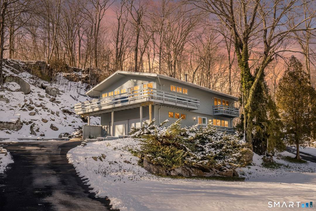 Flowing with natural light and just minutes from Bethel's vibrant downtown, this contemporary 4 bedroom, 3 full bath home offers the perfect blend of modern style, warmth, and flexibility.