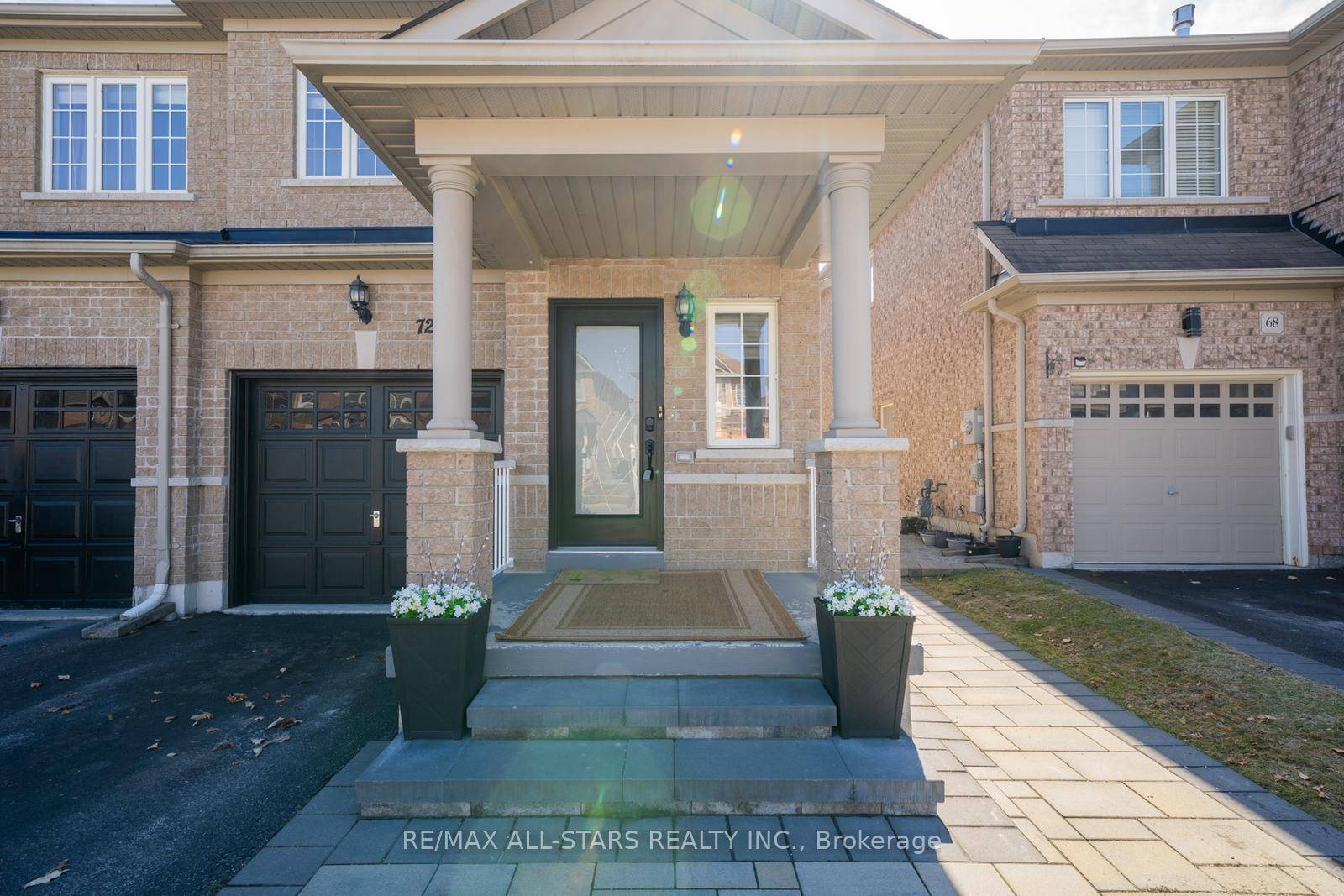 Welcome to 72 Daws Hare Crescent, a charming end unit townhome on a quiet Stouffville street.