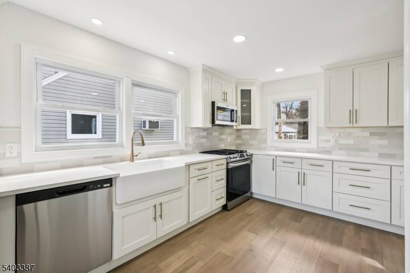 Enjoy peaceful walks to the lake from this completely renovated 4 bedroom, 3 bath custom home in the highly desirable Lake Edenwold community.