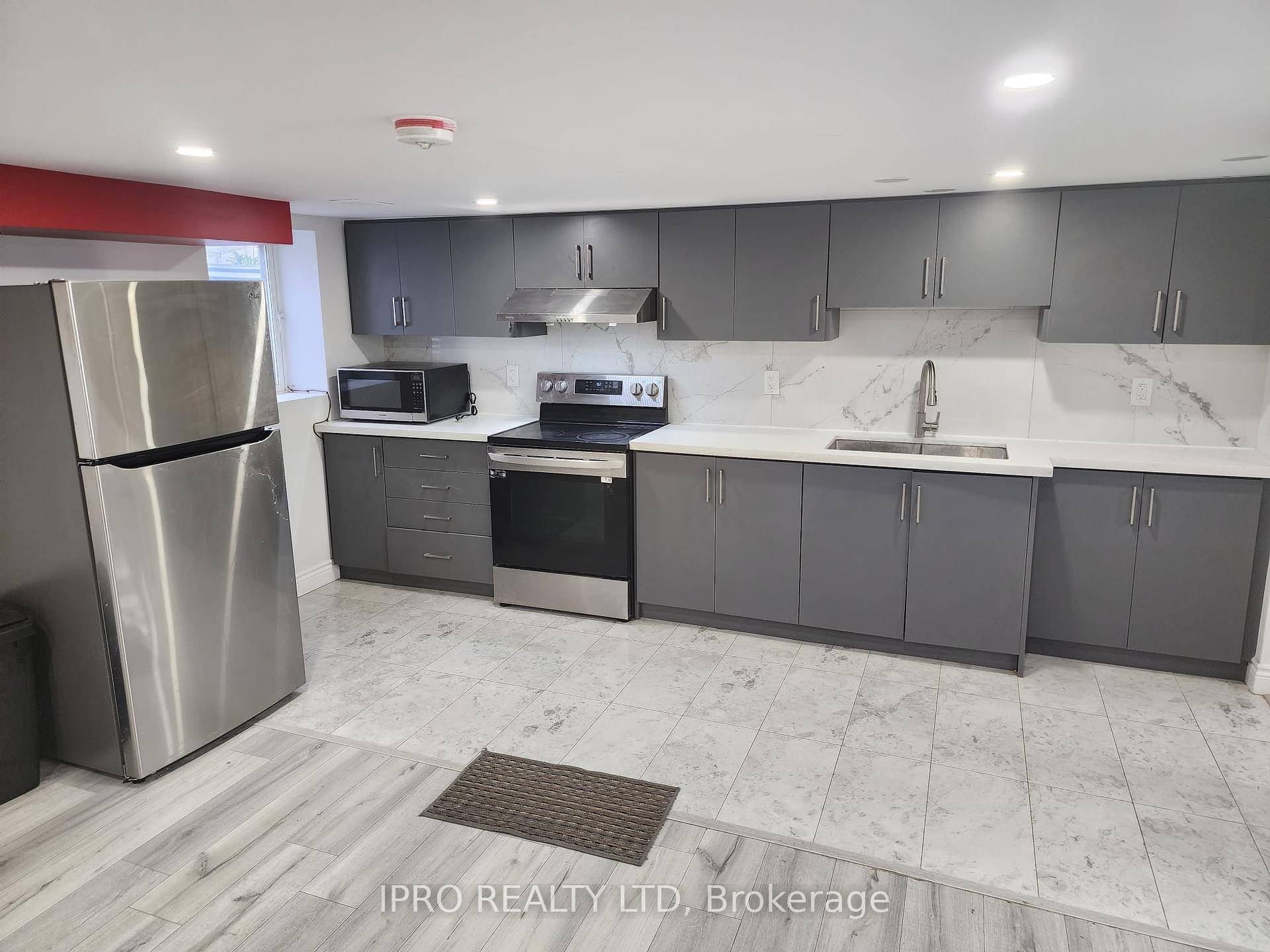 Near Fairview Mall Very Clean And Well Maintained 3 Bedroom Detached Lower Portion Of The House With 2 Car Parking, And Separate Laundry.