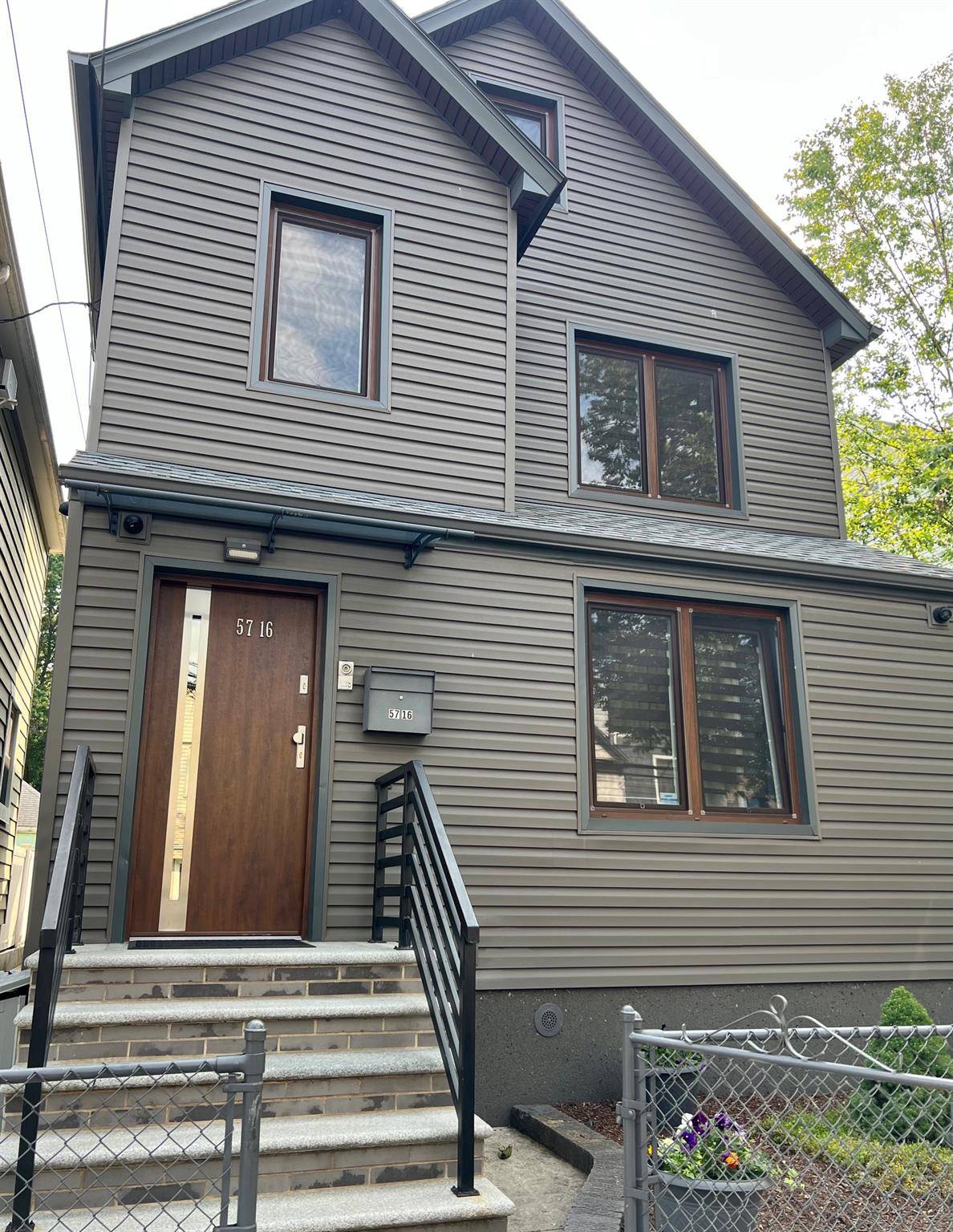 Welcome to this luxurious, fully detached two family home in the heart of Maspeth.