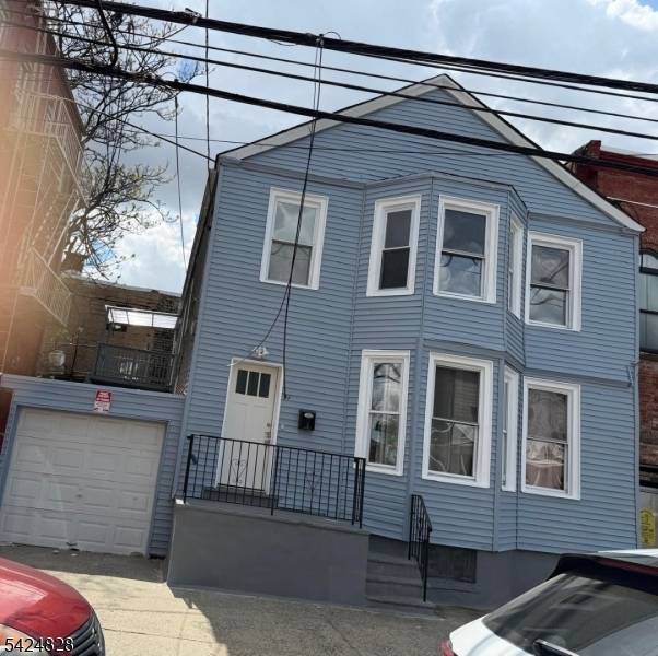 Updated 2 family home located in a highly desirable section of Jersey City.