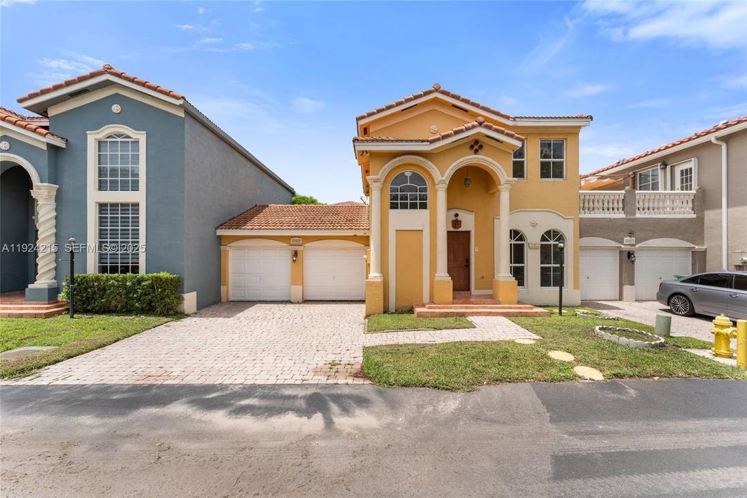 Welcome to your next home, tucked away in an exclusive community of Doral.