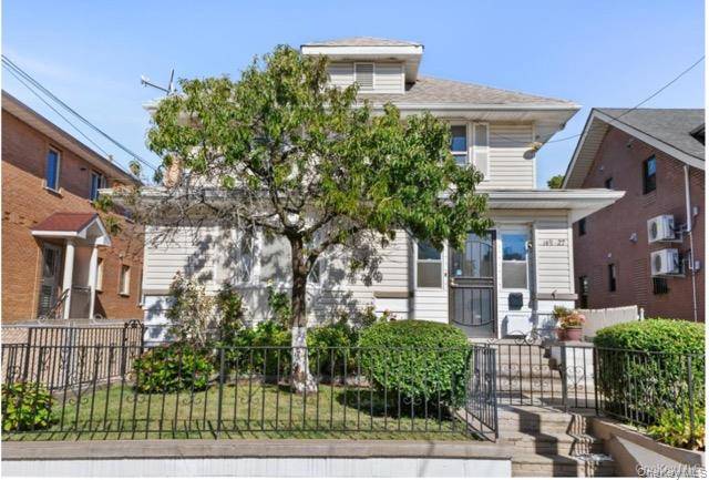 Rare Two dwelling Detached Home in Prime Flushing Location.