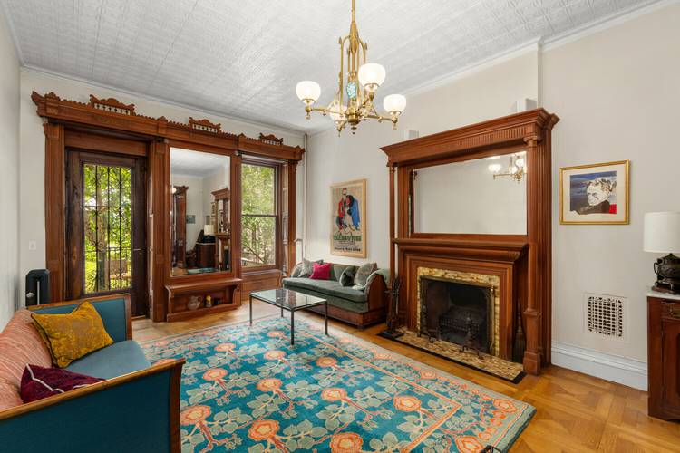 Move right in and enjoy one of the most appealing townhouse layouts currently available in Morningside Heights.