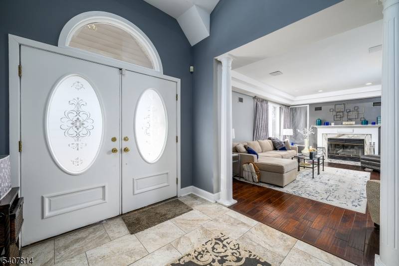 This is a beautifully maintained, sun filled end unit townhome in desirable Timberbrooke, offering a flexible layout that is rare in Bedminster.