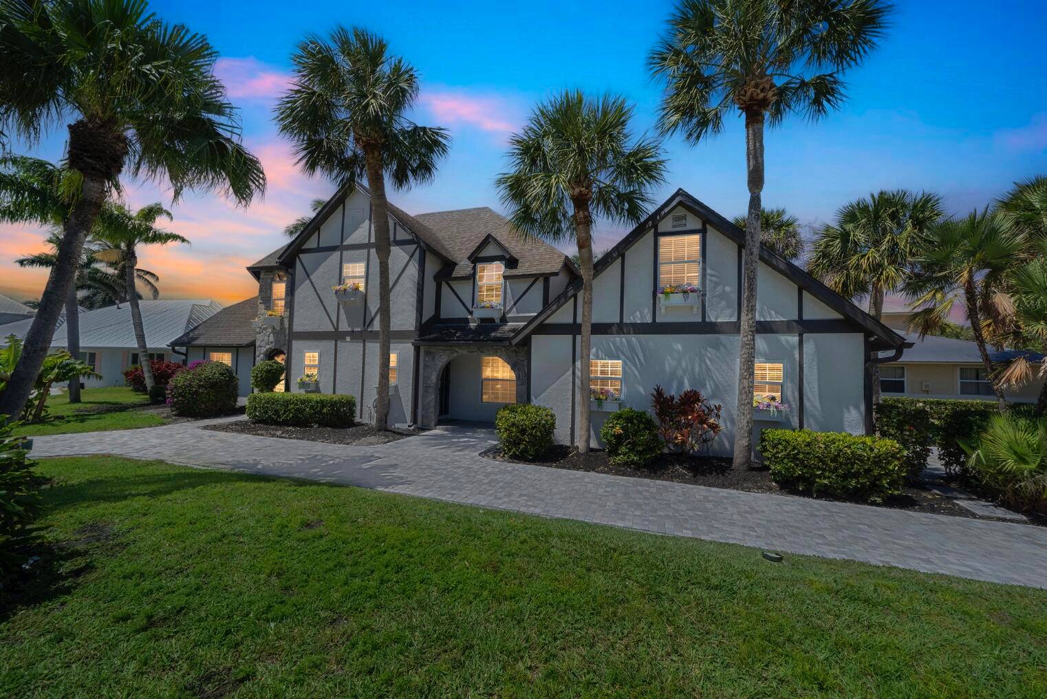 Regal, Tudor style home with private dock, new boat slip and ocean access 10 minutes to inlet on North Hutchinson Island.