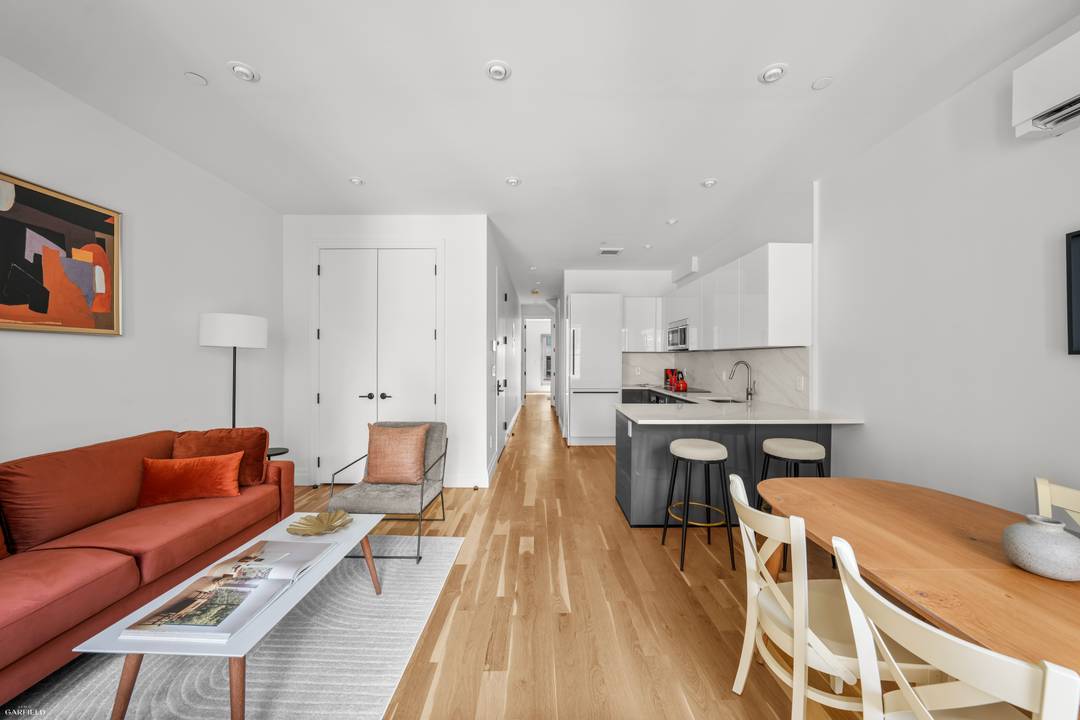 Welcome to this beautiful 1, 048 square foot penthouse duplex townhouse with two bedrooms, two bathrooms, and two private rooftop terraces.