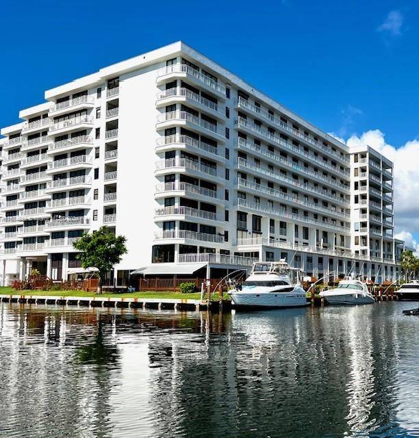 Relax on your private balcony overlooking the Intracoastal waterways at The Pilot House waterfront in Coral Ridge Country Club Estates.