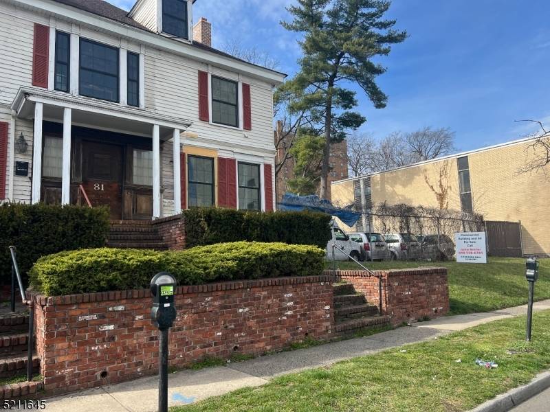 Three Story Office Building with Full Basement.