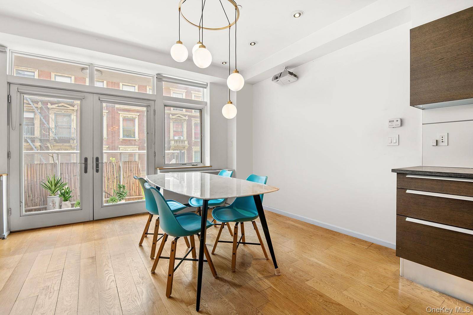 Tax abated and bathed in southern light, this two bedroom, two bathroom boutique condominium offers a serene and stylish urban retreat with extraordinarily low carrying costs.