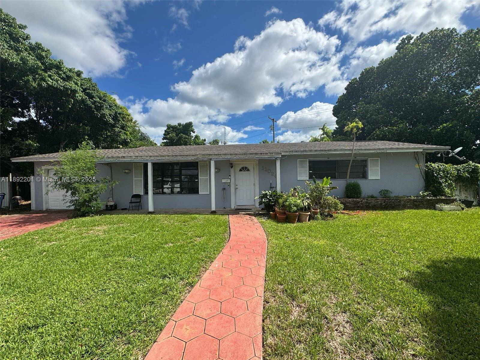 Welcome to 11020 SW 179th St a cozy 3 bedroom, 2 bathroom single family home nestled in a quiet and established neighborhood in South Miami.