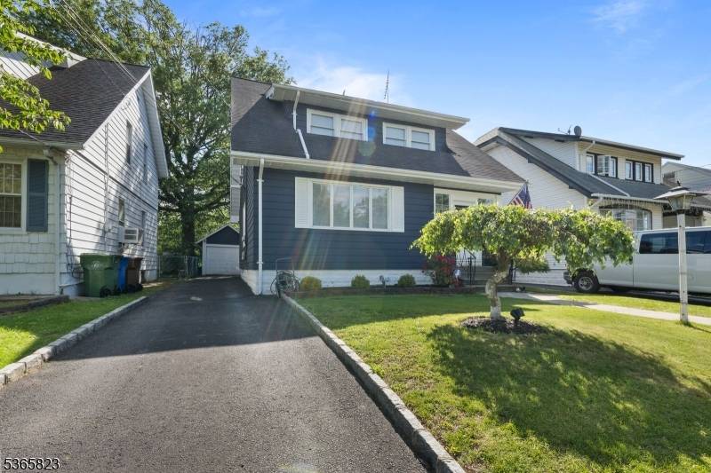 CHARMING COLONIAL HOME IN A SOUGHT AFTER NEIGHBORHOOD.