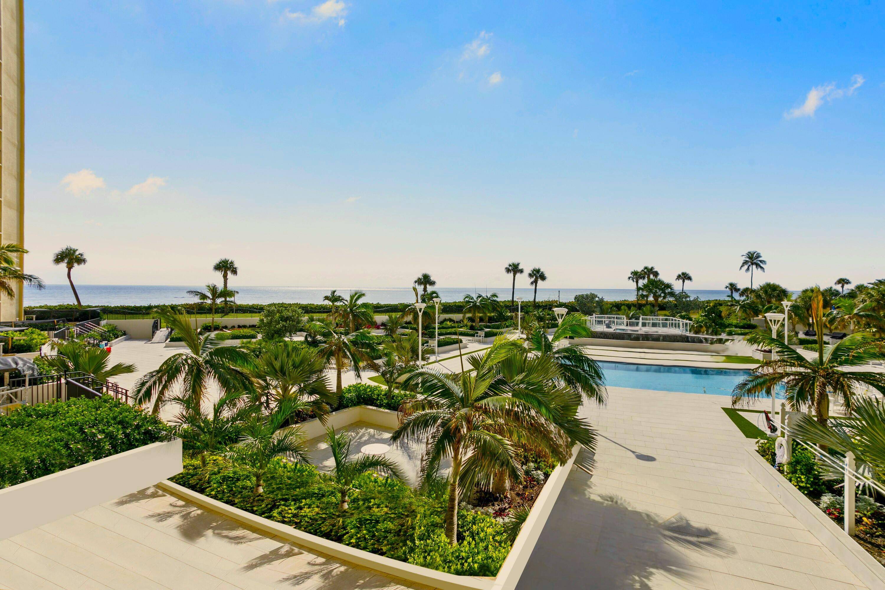 Expansive SE view from this 2nd floor condo in Ocean Trail which is located directly on the beach in Jupiter.