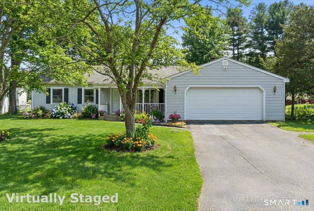 Welcome to 60 Cedar Ln, a beautifully updated 3 bedroom, 1.