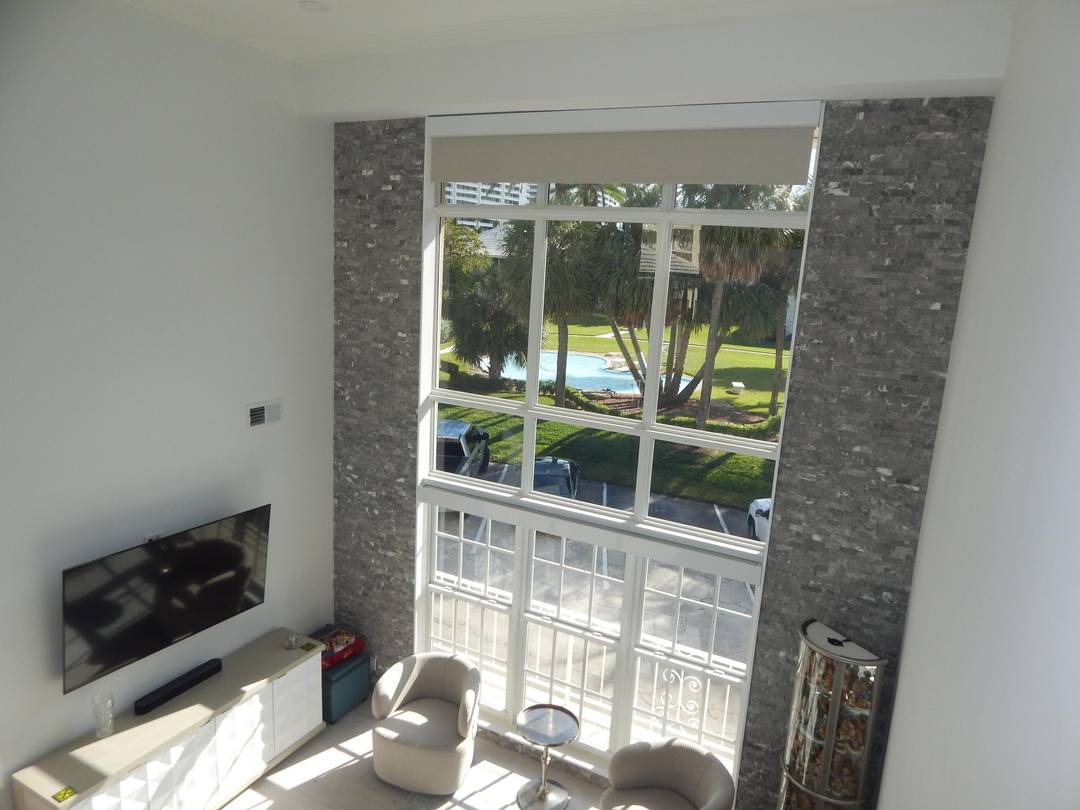 VERY RARE SELDOM AVAILABLE COMPLETELY REMODELED LUXURIOUS TOWNHOME JUST STEPS TO THE BEACH !