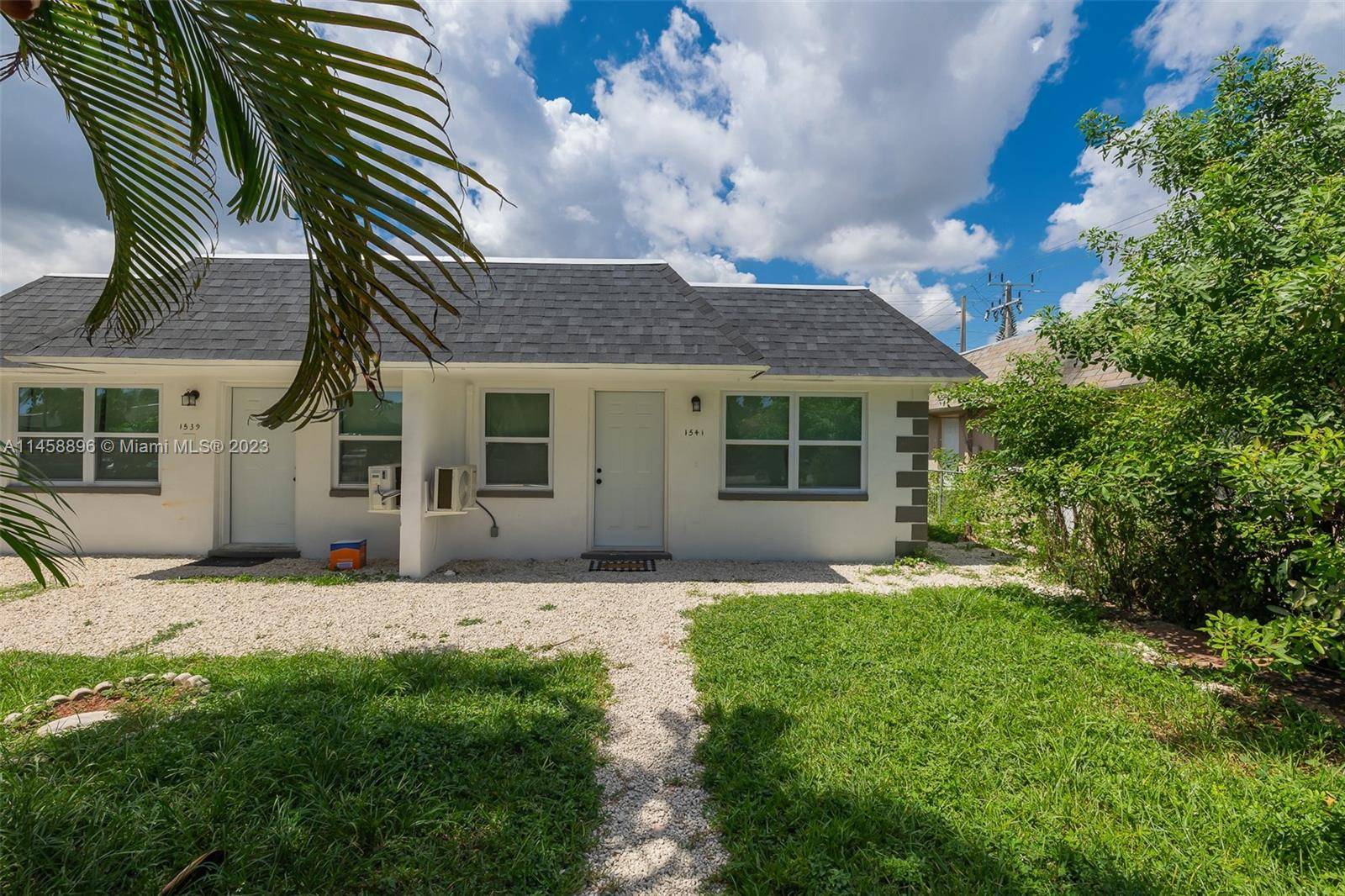Recently renovated Fourplex offering Tremendous Potential !