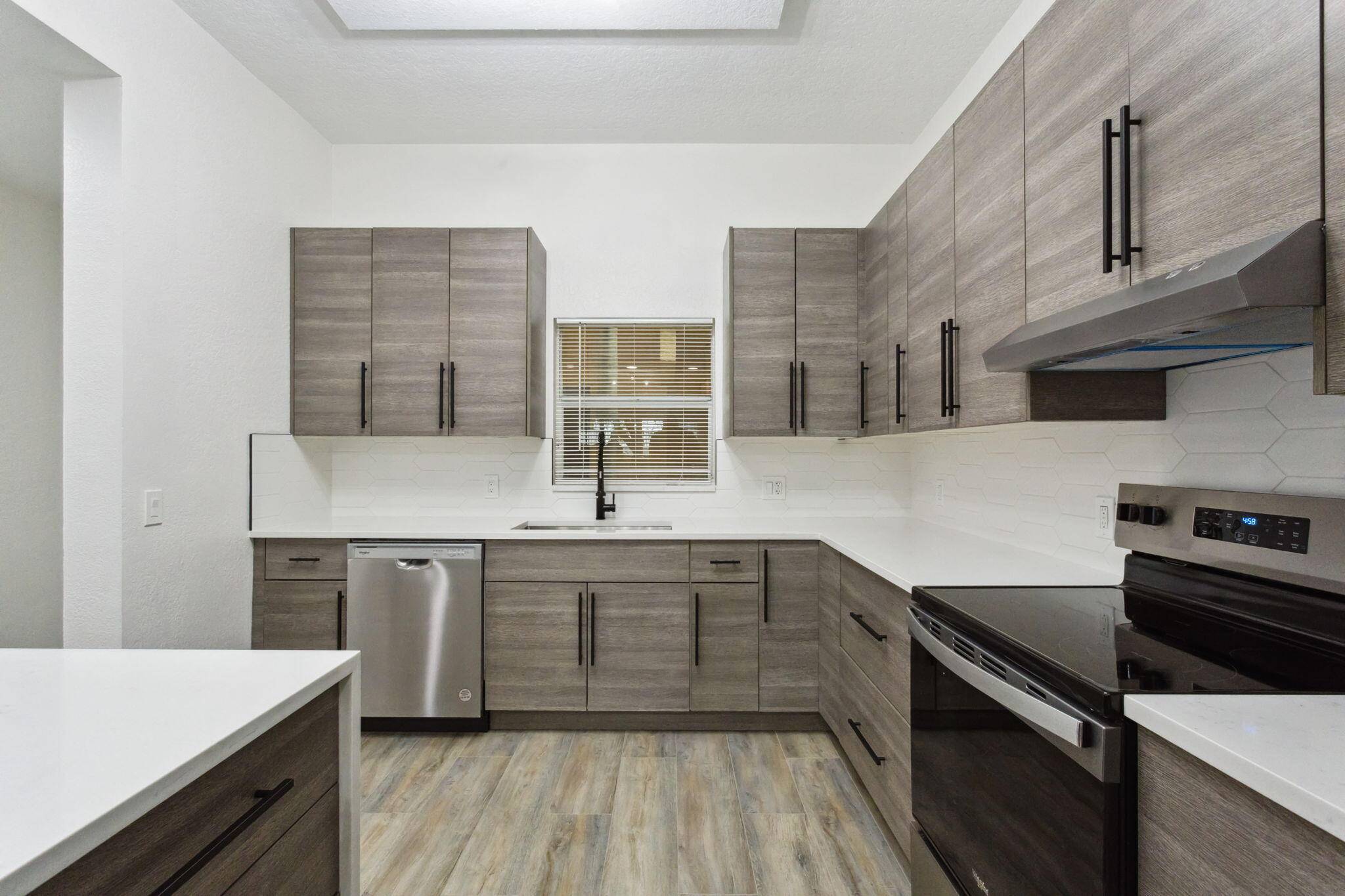 Experience luxury living in this fully renovated 3 bed, 2 bath gated condo with a manned entrance.