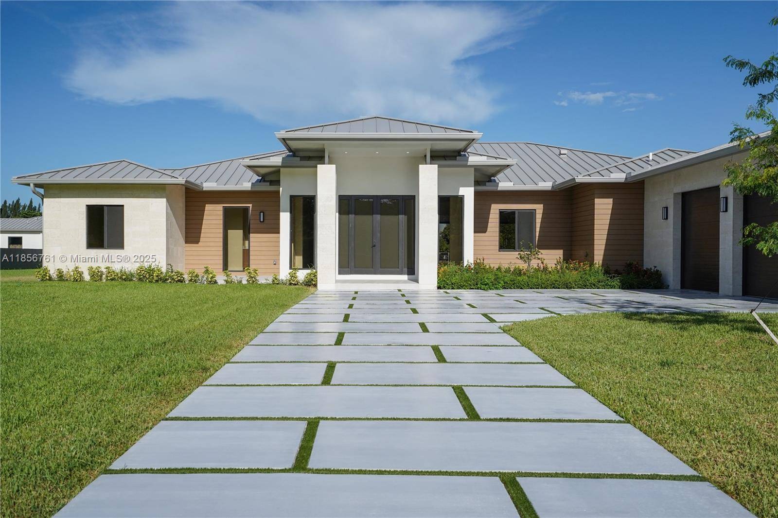 Luxury New Construction Home in Homestead on a Large Lot.