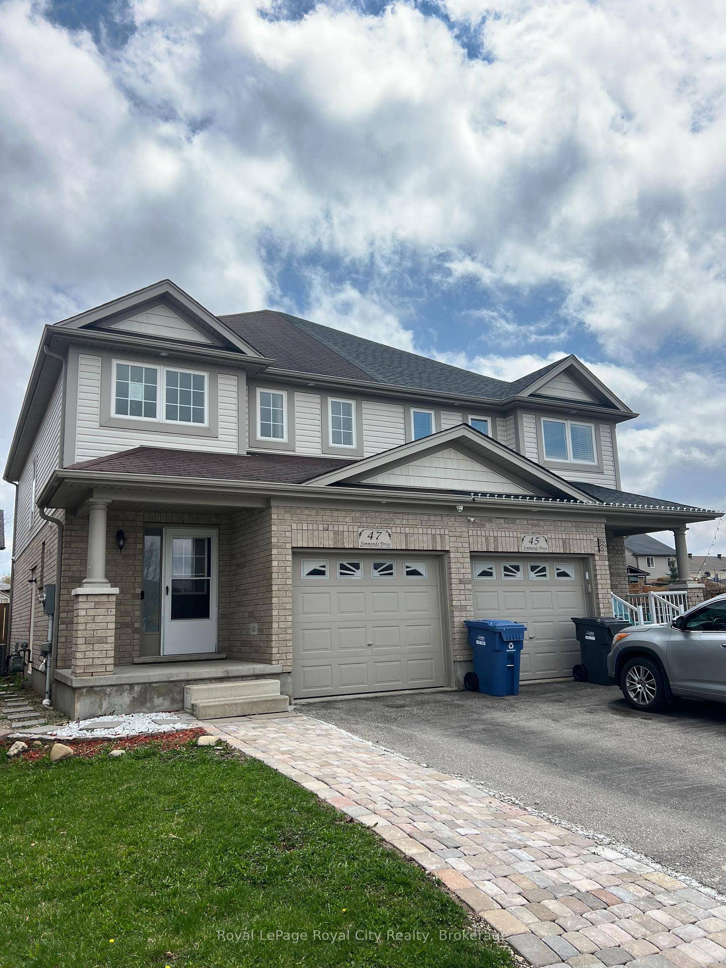 Welcome to this immaculate semi detached home in Guelphs desirable north end.