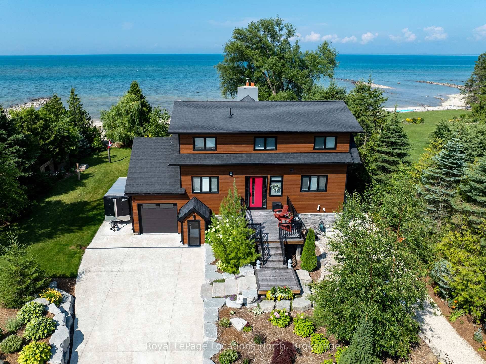 Waterfront Collingwood. Large extensively landscaped waterfront property in Collingwood, approximately 100 feet of frontage and features a 3 bedroom, 2.