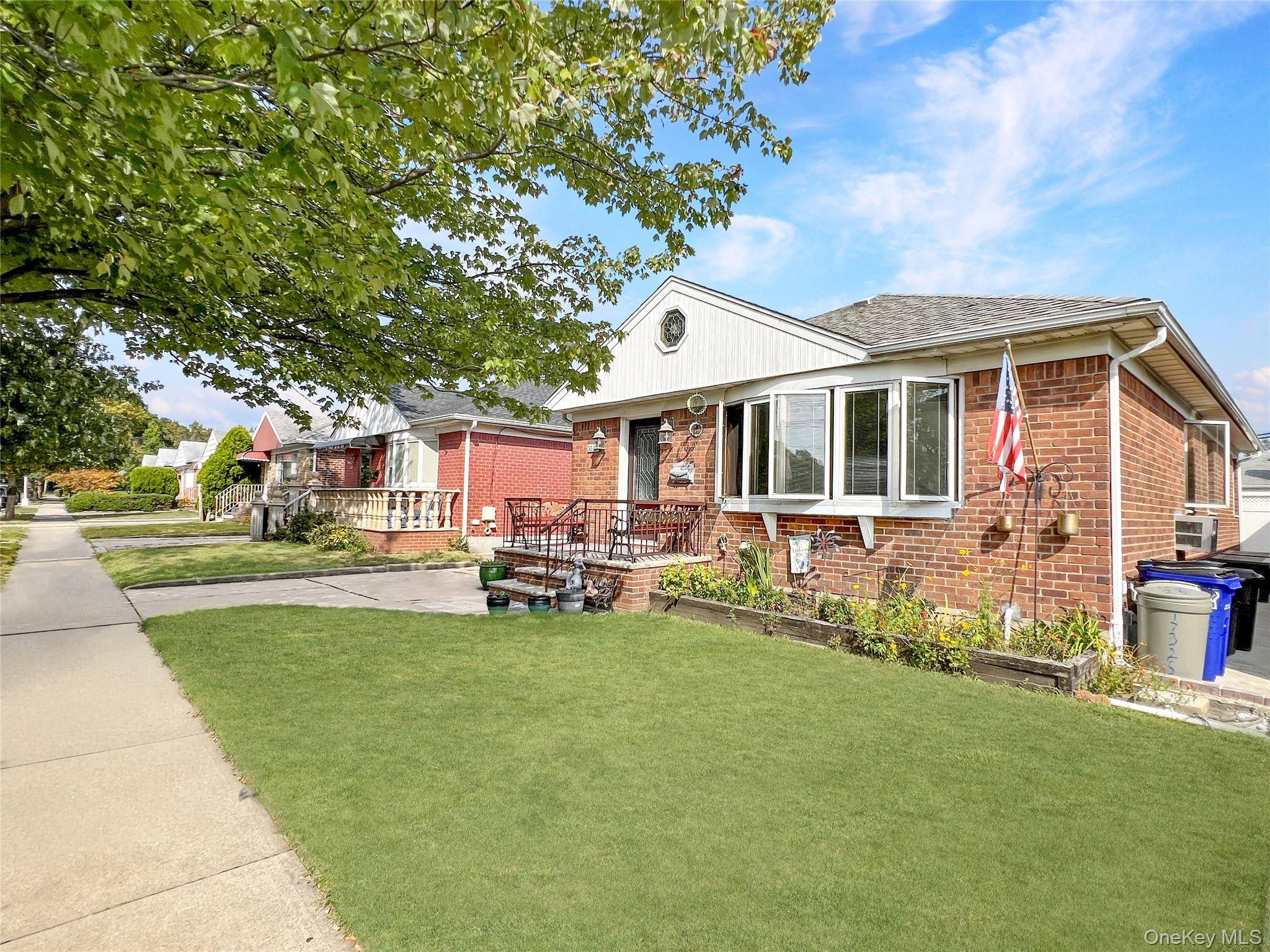 This charming Fresh Meadow brick ranch offers the perfect blend of comfort, style, and convenience.
