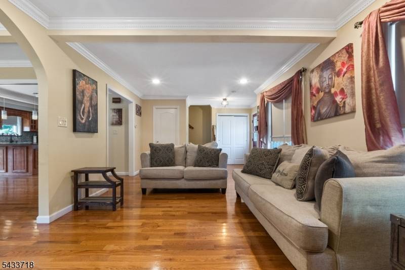 WITH AN ESTIMATED SQFT OF 2, 099 WITH AN ADDITIONAL655 SQFT LODGING A FINISHED BASEMENT, SPACE AND TRANQUILITY AWAITS.