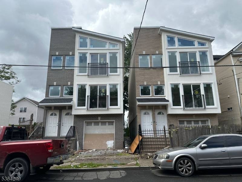 New Two Family Home Under Contruction Located near Weequahic Park, Route 78 Newark Liberty International Airport Features Brick Stucco Front, Hardwood Floors, Central Air, Granit Kitchen Unique Design