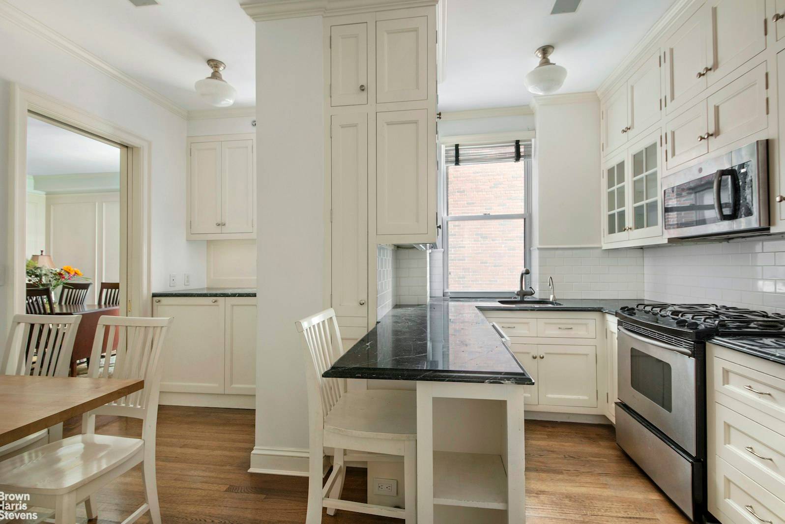 Huge gracious foyer leads to living room and formal dining room EIK has separate laundry area Bedroom wing has 3 bright bedrooms and lots of closet space.